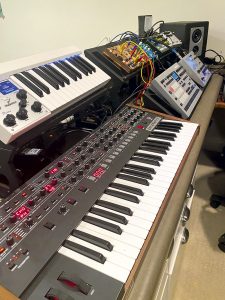 Ricky Reed studio closeup of keyboards